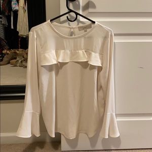 White ruffle shirt